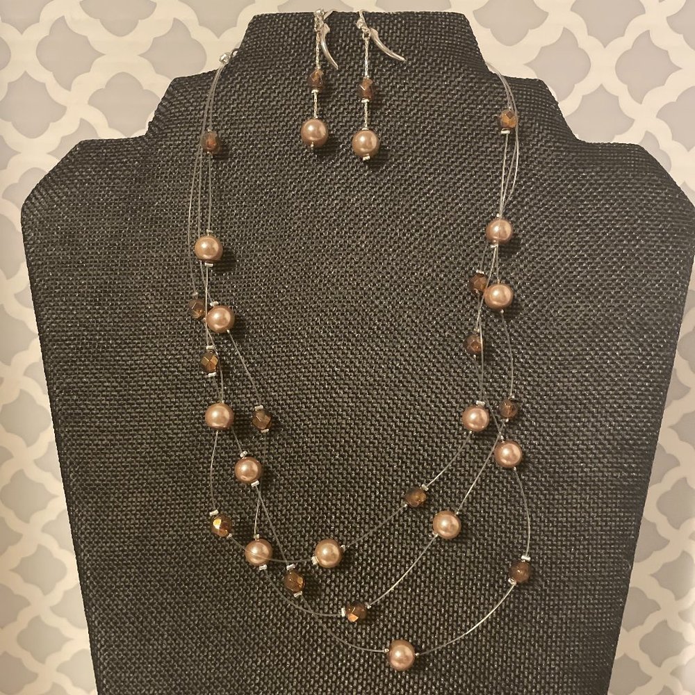 A Handmade necklace and earring set for casual wear.